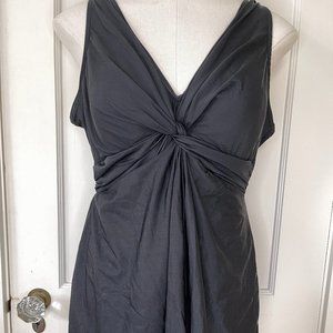 Black Miraclesuit Skirted one piece suit with twist at front